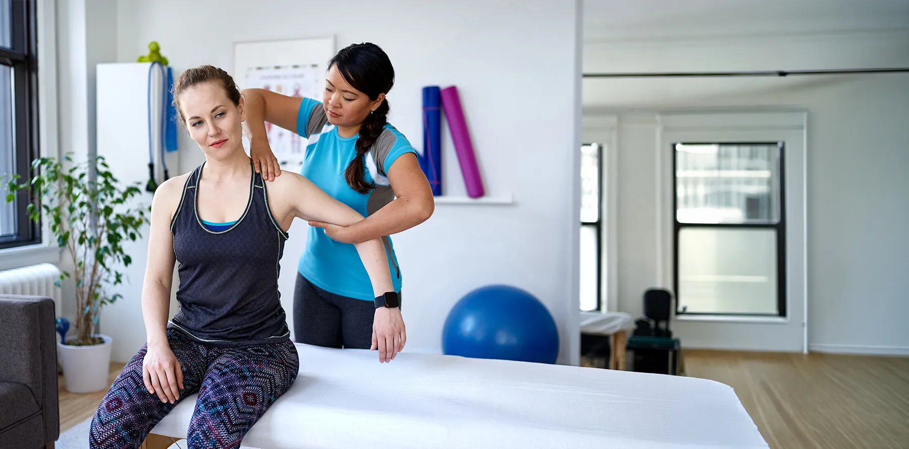 Physical Therapist with a patient during therapy