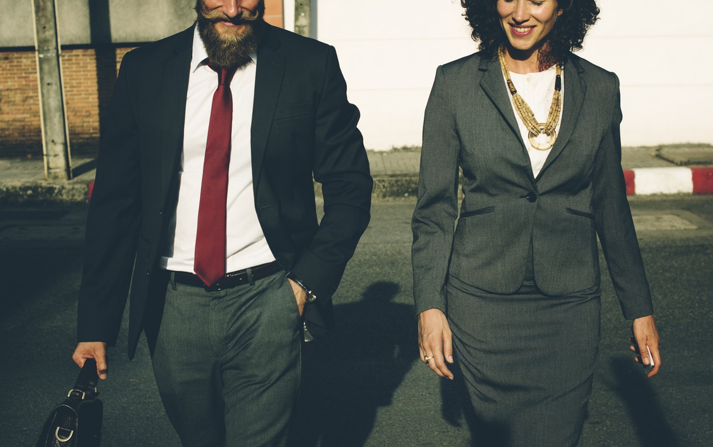 Two happy business consultants