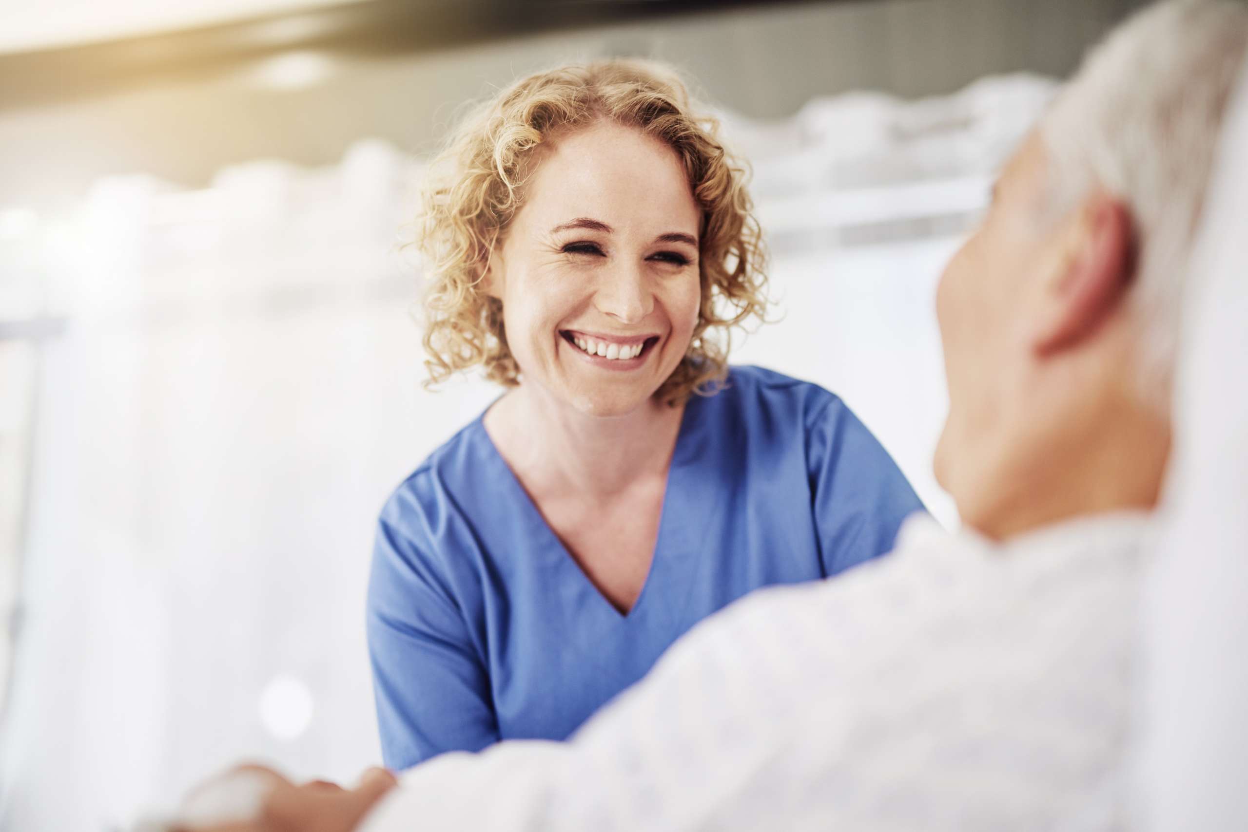 Female carer helping recover patient