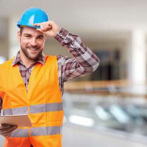A Smiling contractor with digital tableta