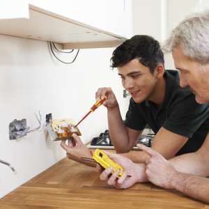 Electrician working at a new home