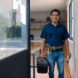 Happy handyman after a house call