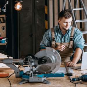 A handyman plans woodworking project