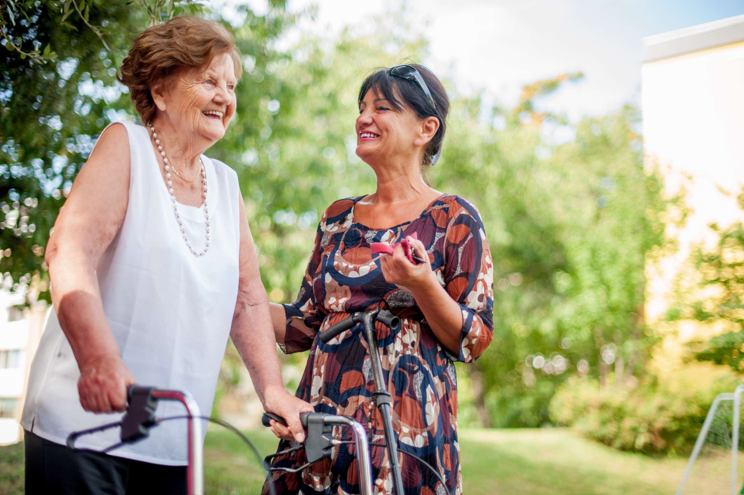 Caregiver with an Elderly Woman outdoors