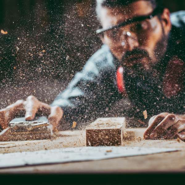 A woodworker works in a workshop