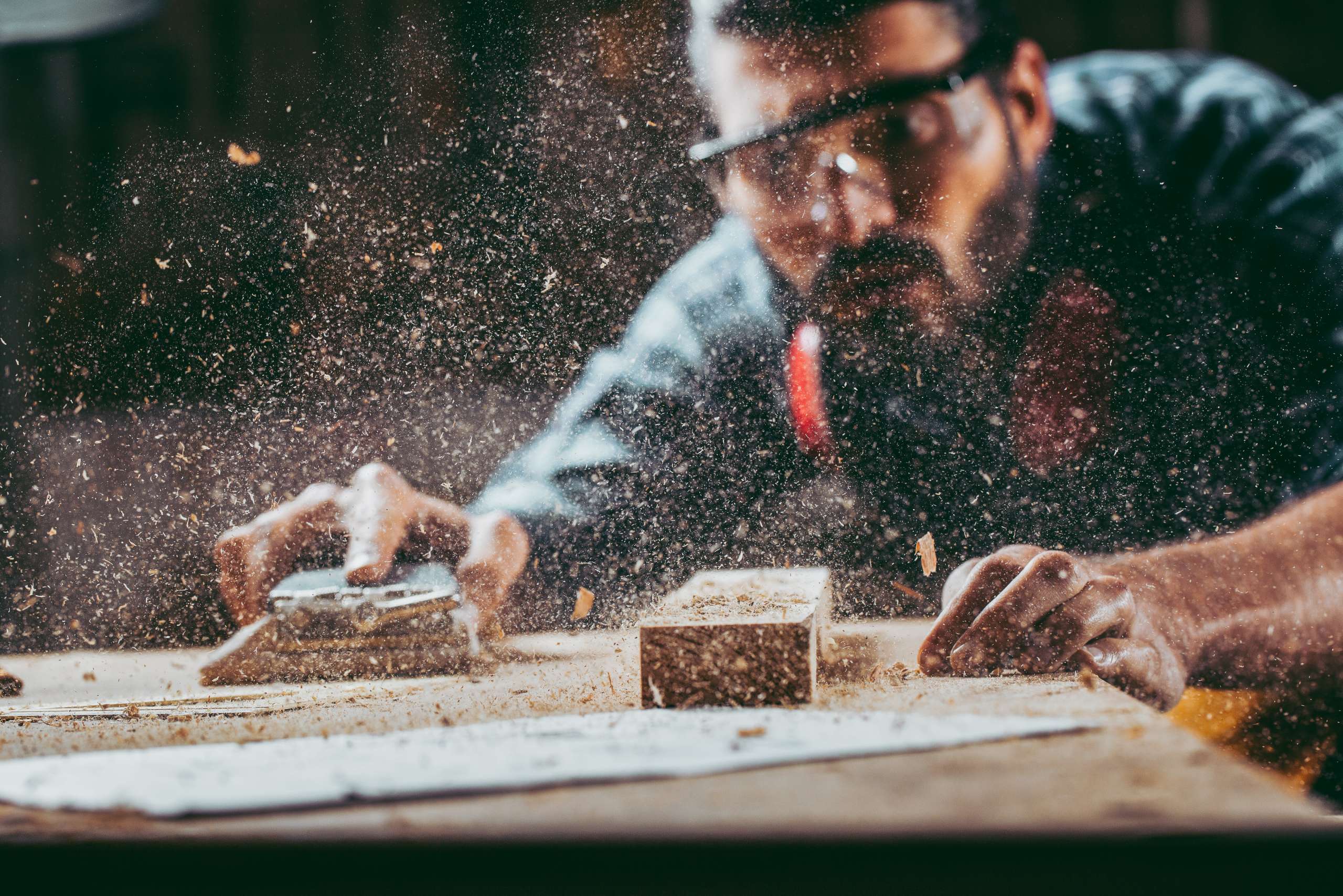 A woodworker works in a workshop