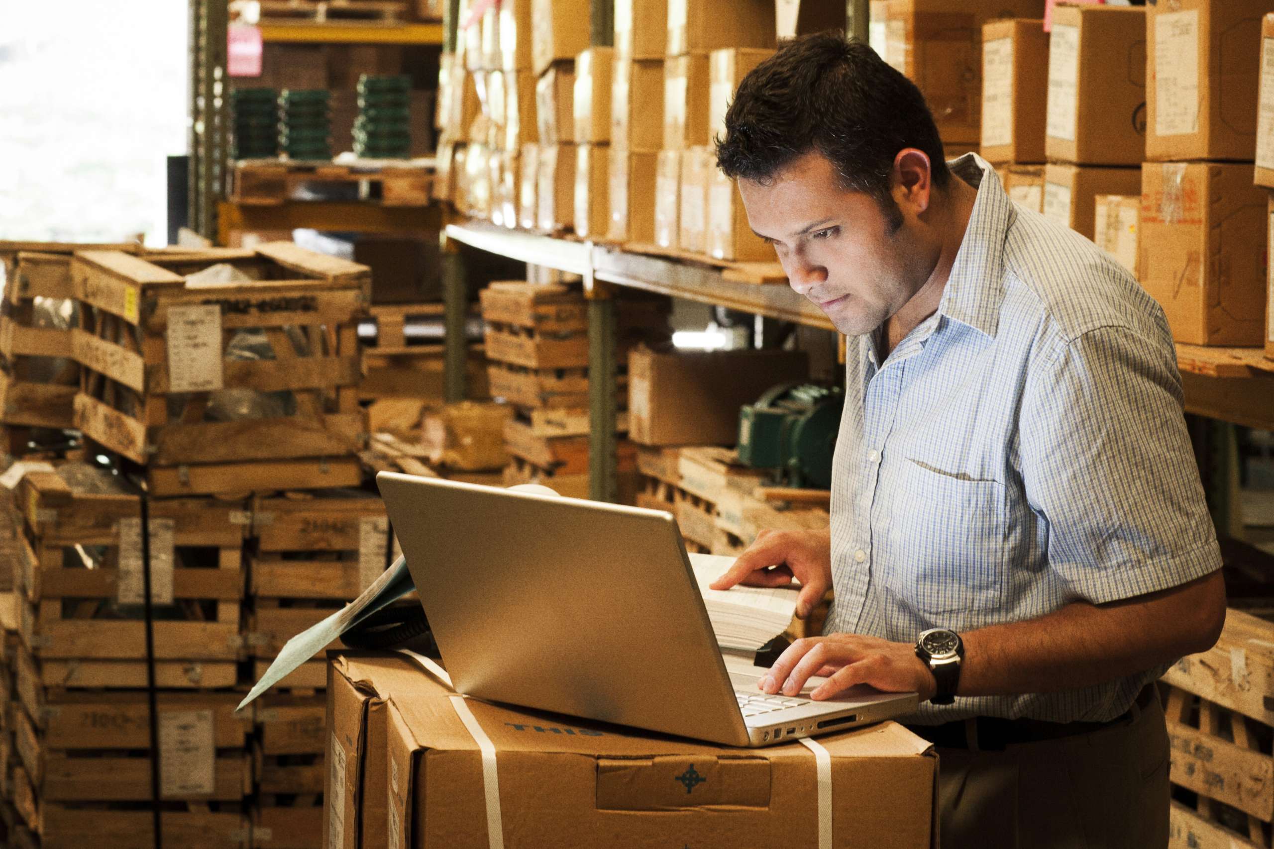 A business owner working in warehouse