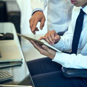Business owners analyzing documents
