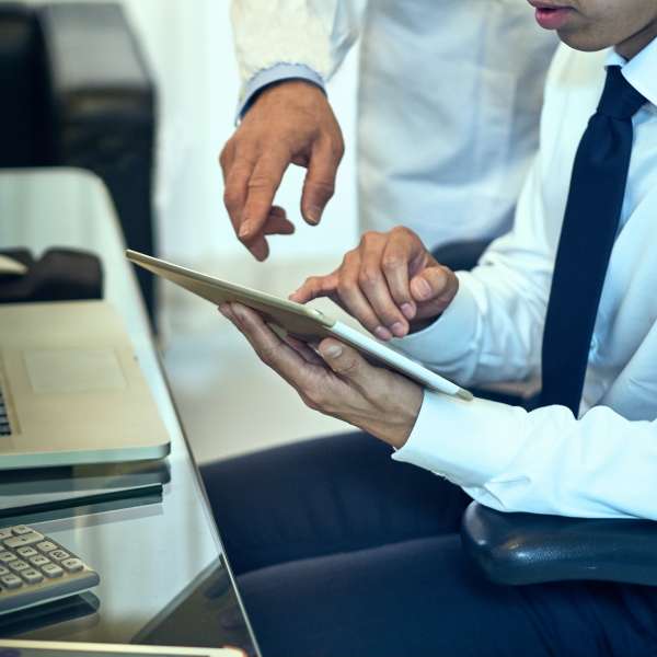 Business owners analyzing documents