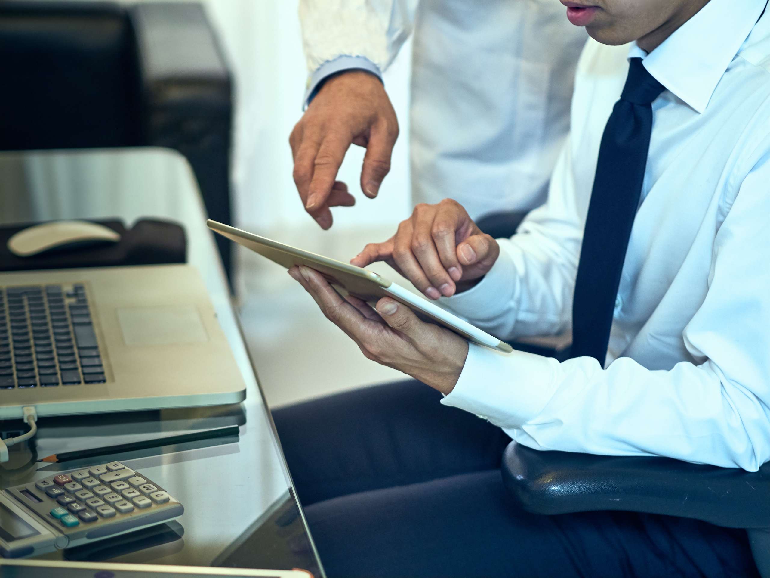 Business owners analyzing documents