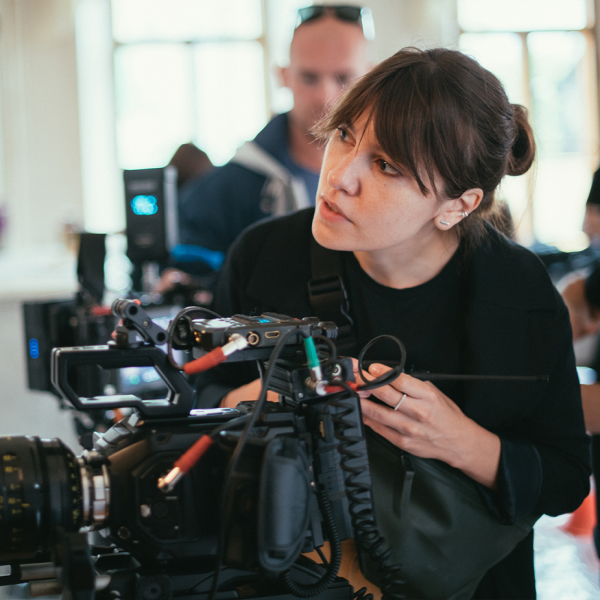 Videography insurance: a female videographer