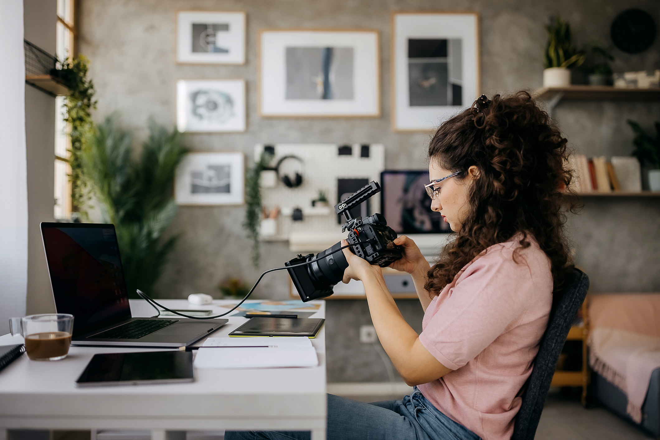 A photographer working from her home office studio