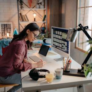 A photographer working from home office