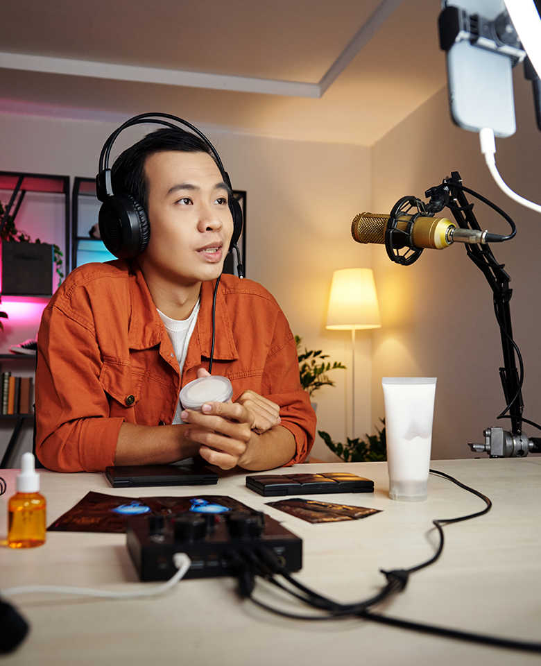 Blogger and content creator insurance: A creator in front of mic