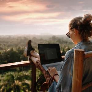 Young business woman working at the computer.