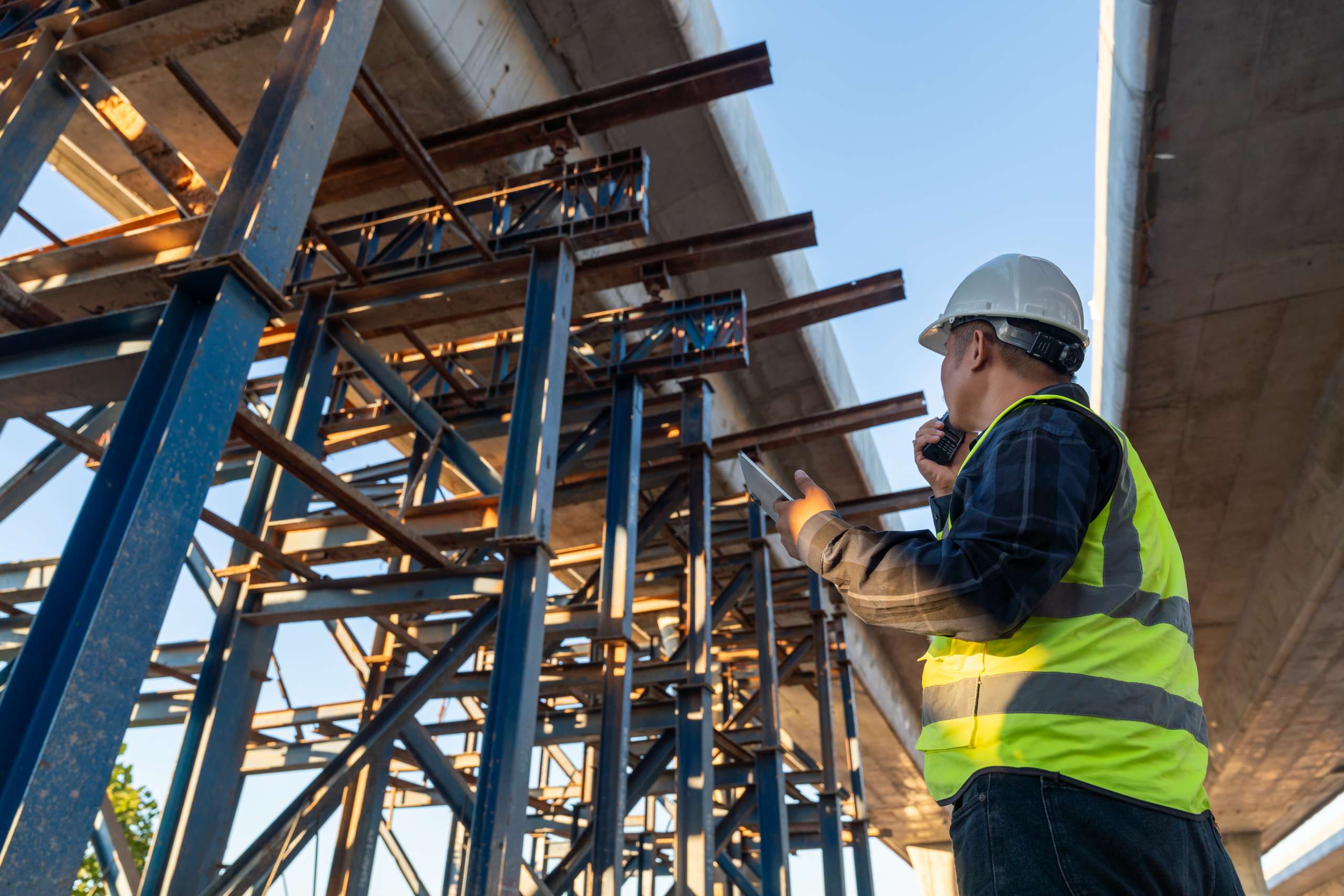 A contractor inspects the structure road construction work at road construction