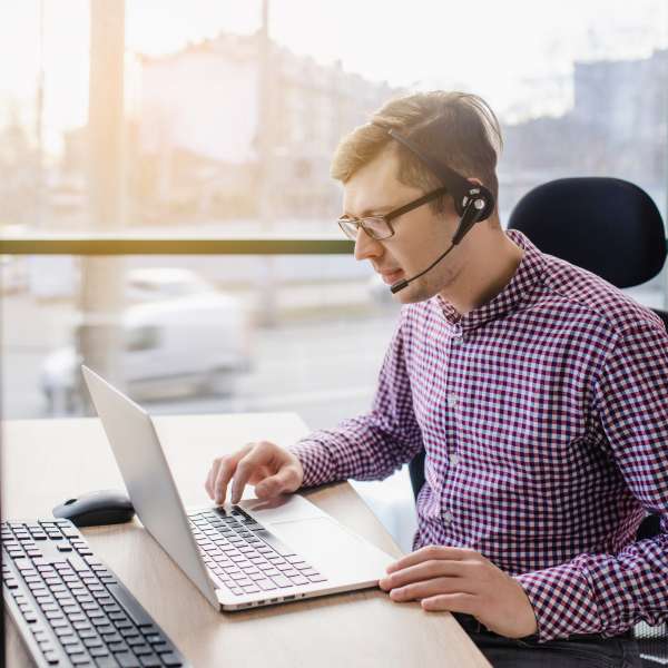 Young man with casual shirt and glasses
