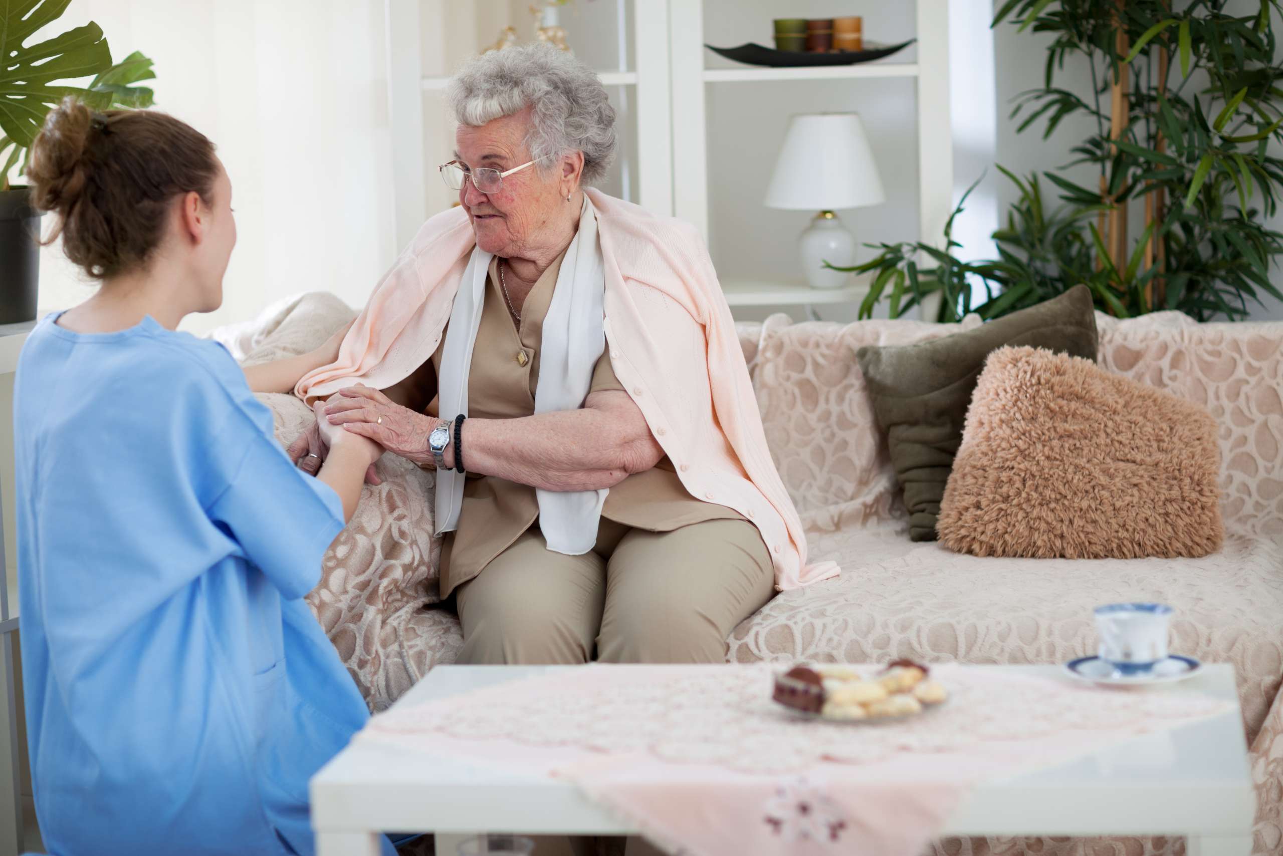 Nurse talking with an old woman