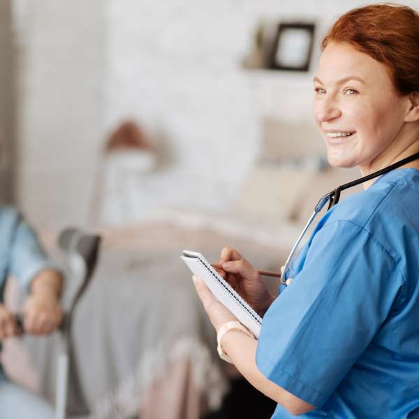 Doctor providing professional services at home