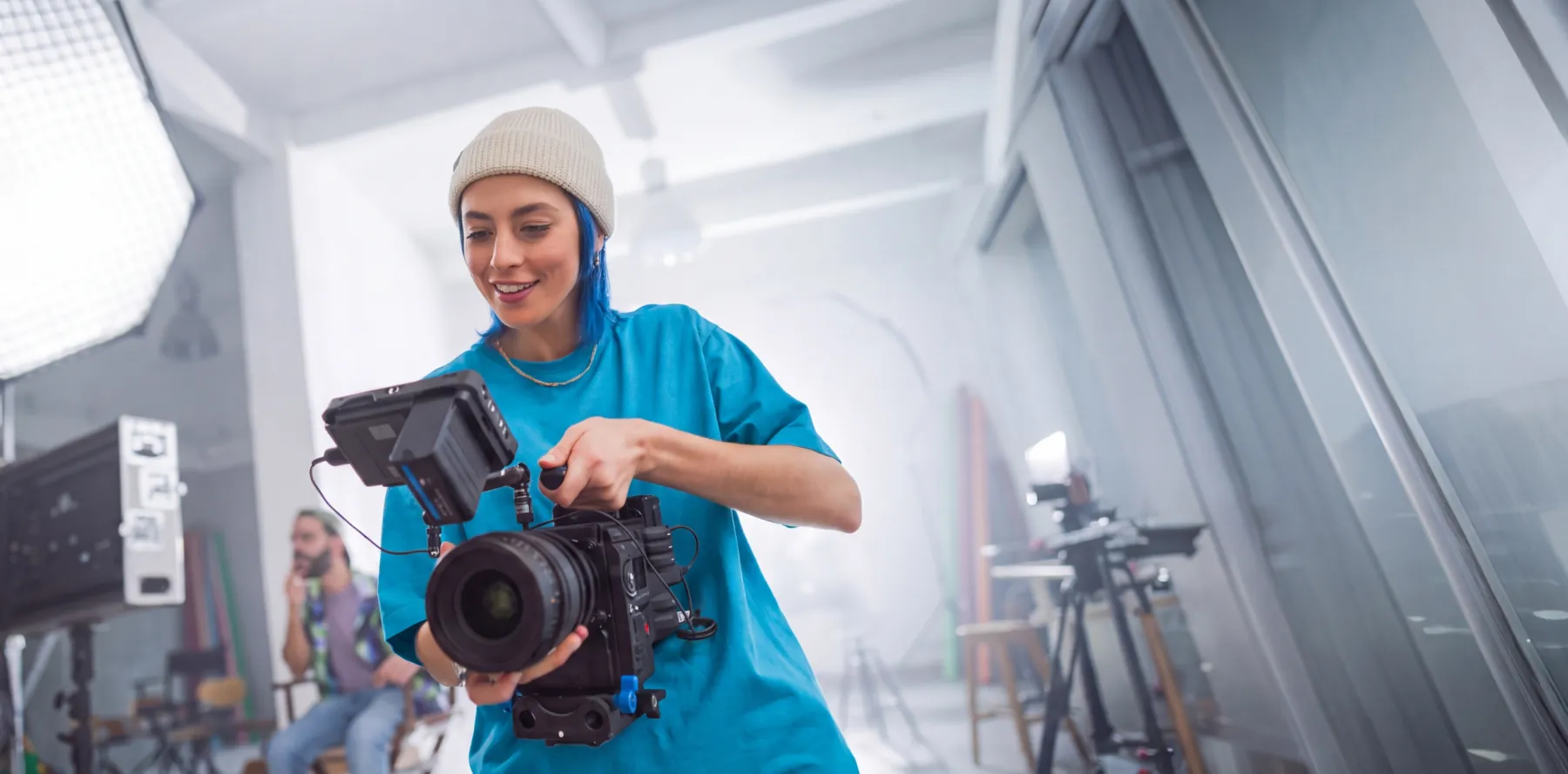 videographer using camera on a shoot