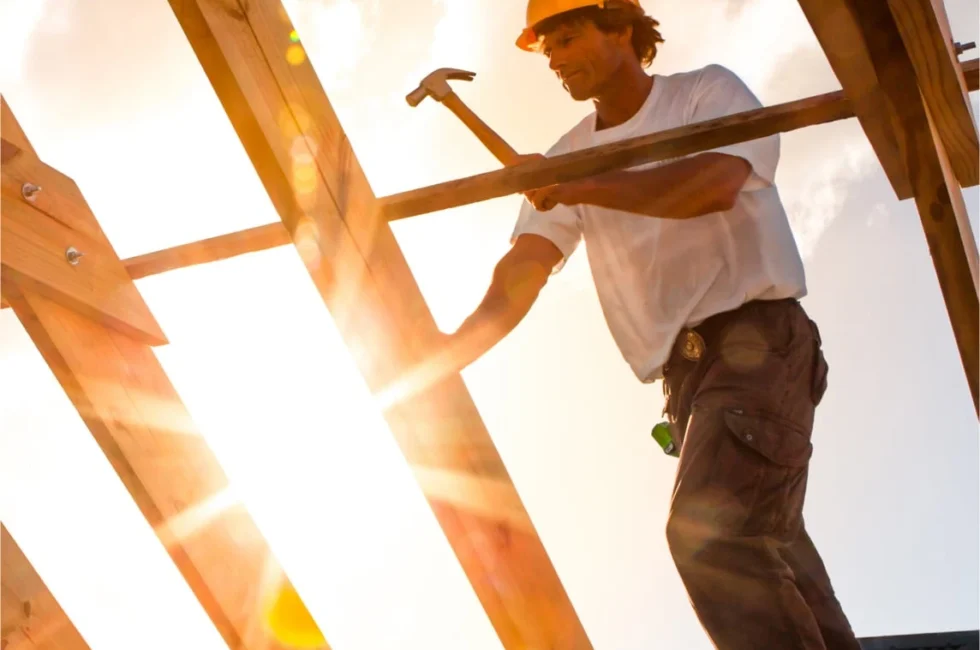 carpenter working on a roof