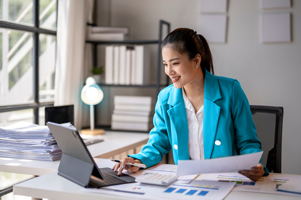 Accountant working in the office using a laptop