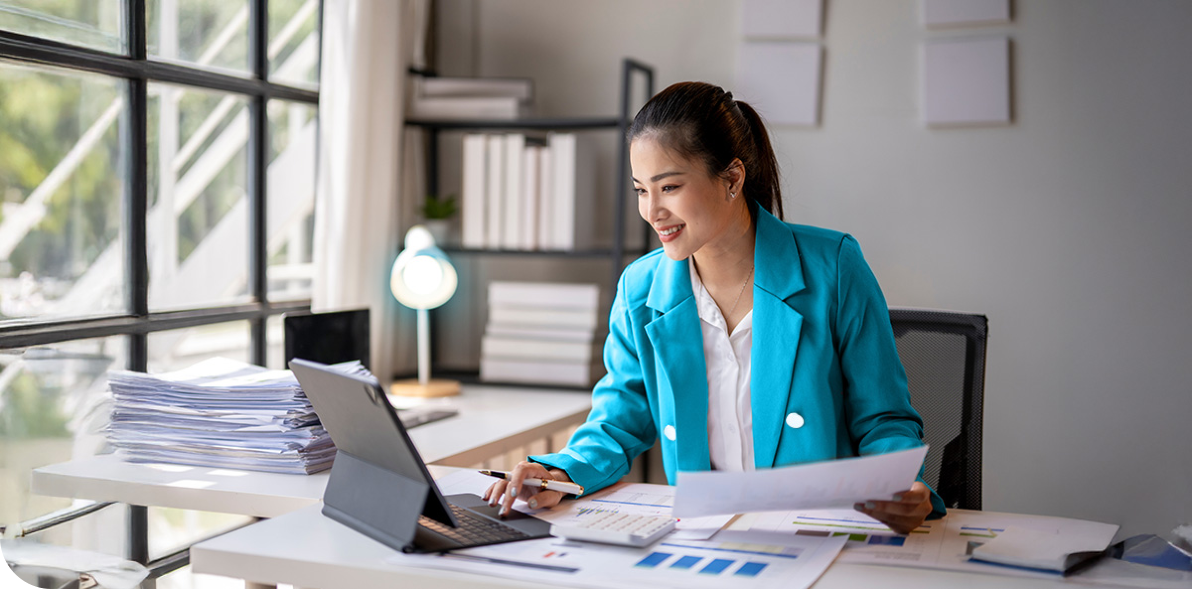 Accountant working in the office using a laptop